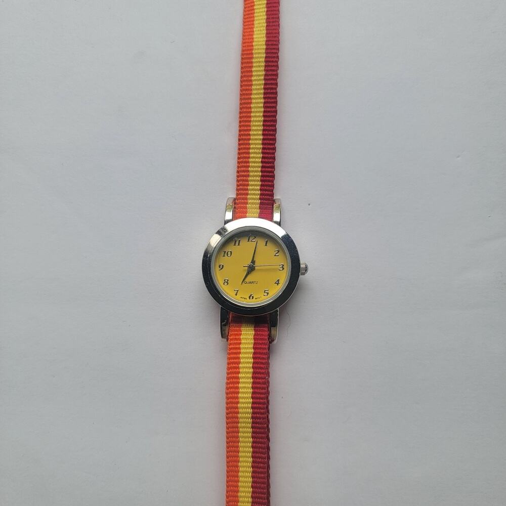 Womens Watch Yellow Dial Silver Case 25mm Multicolor Strap Quartz